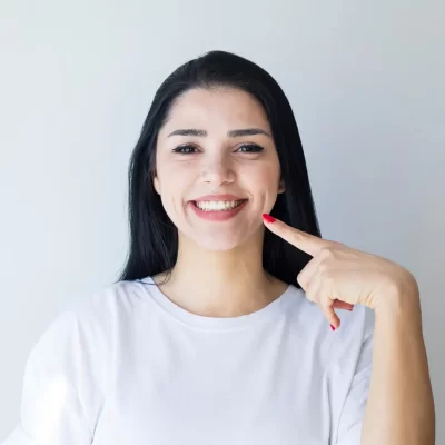 Perfect with Dental Smile Happy with Woman after Dental Implant Surgery in Dubai.